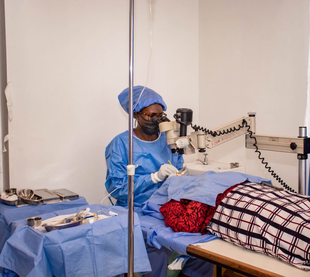 Dr. Berlin Akoth performing the eye cataract surgery