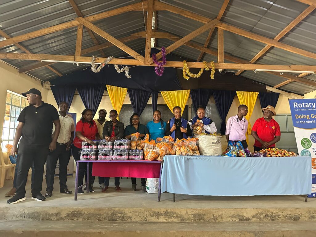Rotary Club members and learners during community service.